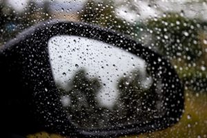 Window with rain droplets | TC's Mobile Detailing | Lakeland FL | Outshine The Rest | Benefits of Glassparency